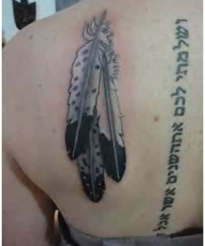Black & White Eagle Feathers Tattoo On Girl Back