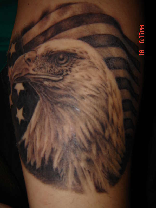 Black & White Ink American Flag With Eagle Tattoo On Arm
