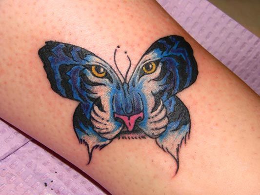 Blue & Black Ink Unique Tiger Butterfly Tattoo On Forearm