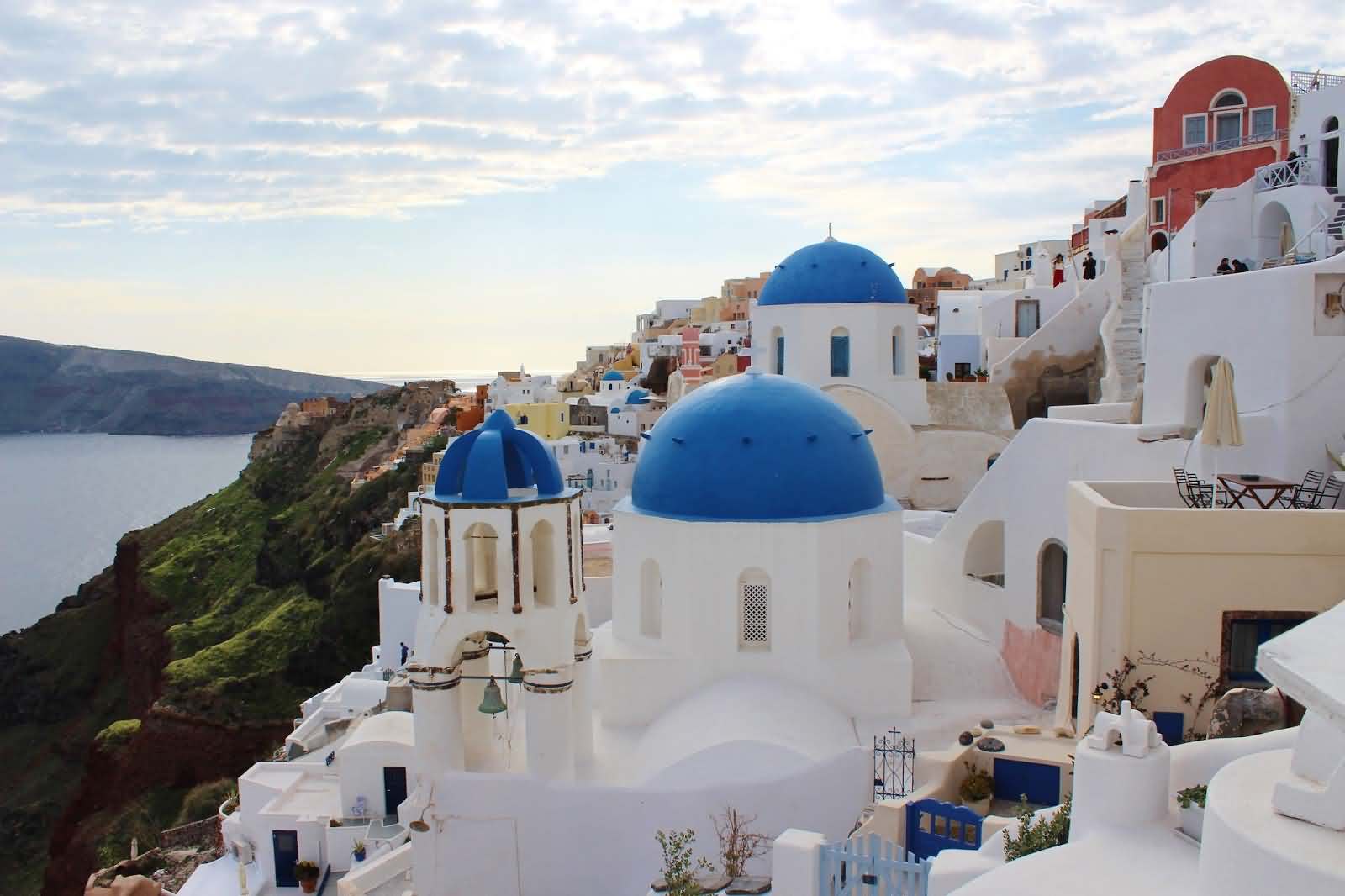 Blue Dome Church And White Washed Houses Of Santorini Island