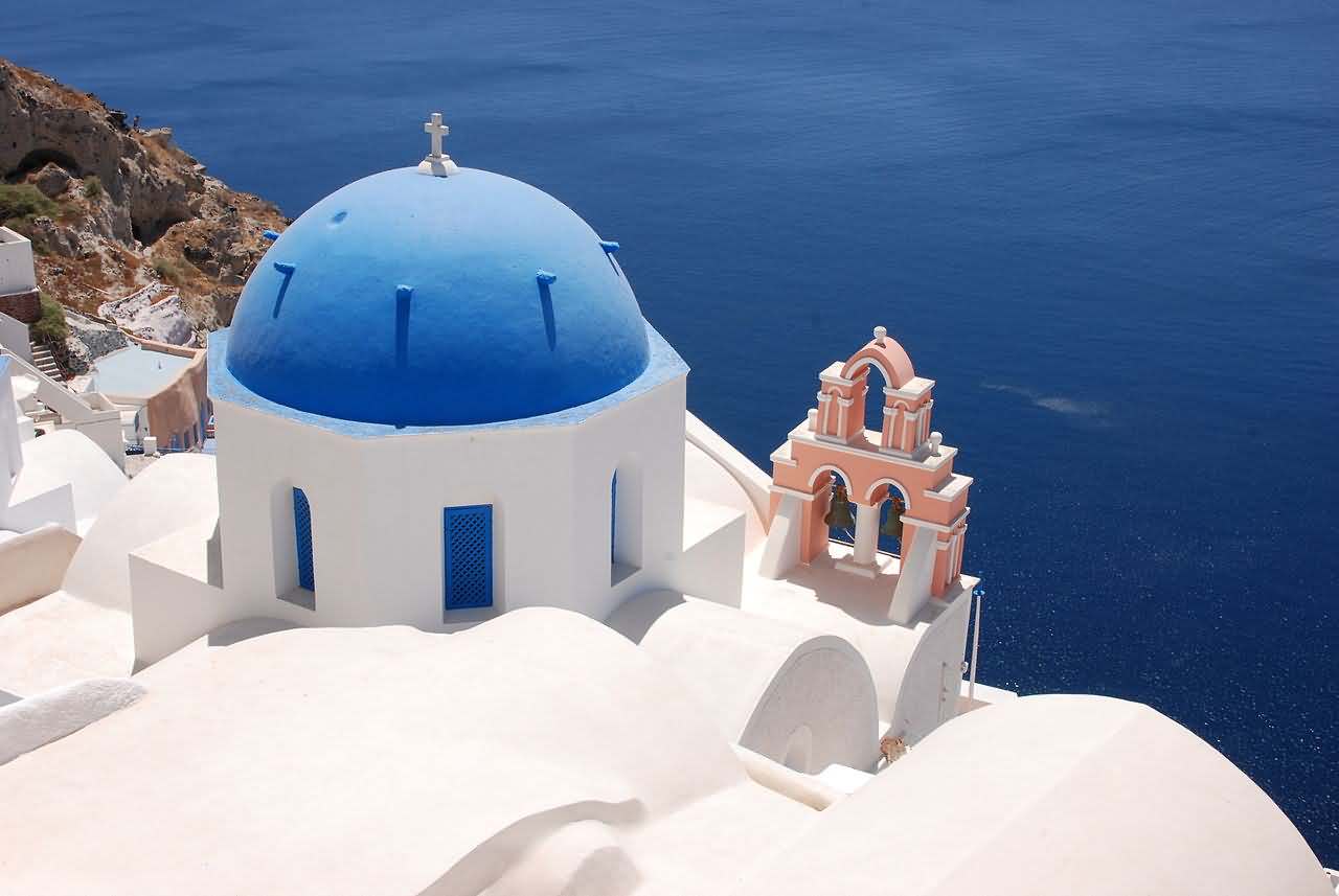 Blue Domed Church In Santorini, Greece