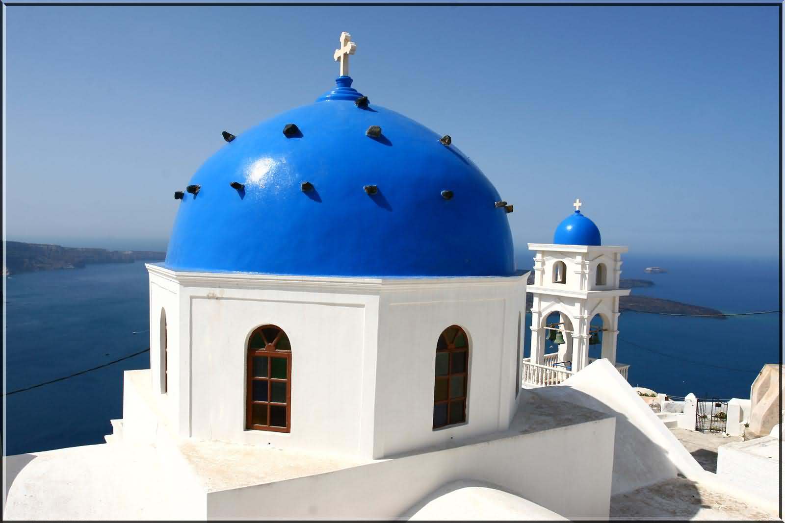 Blue Domed Church On Santorini Island