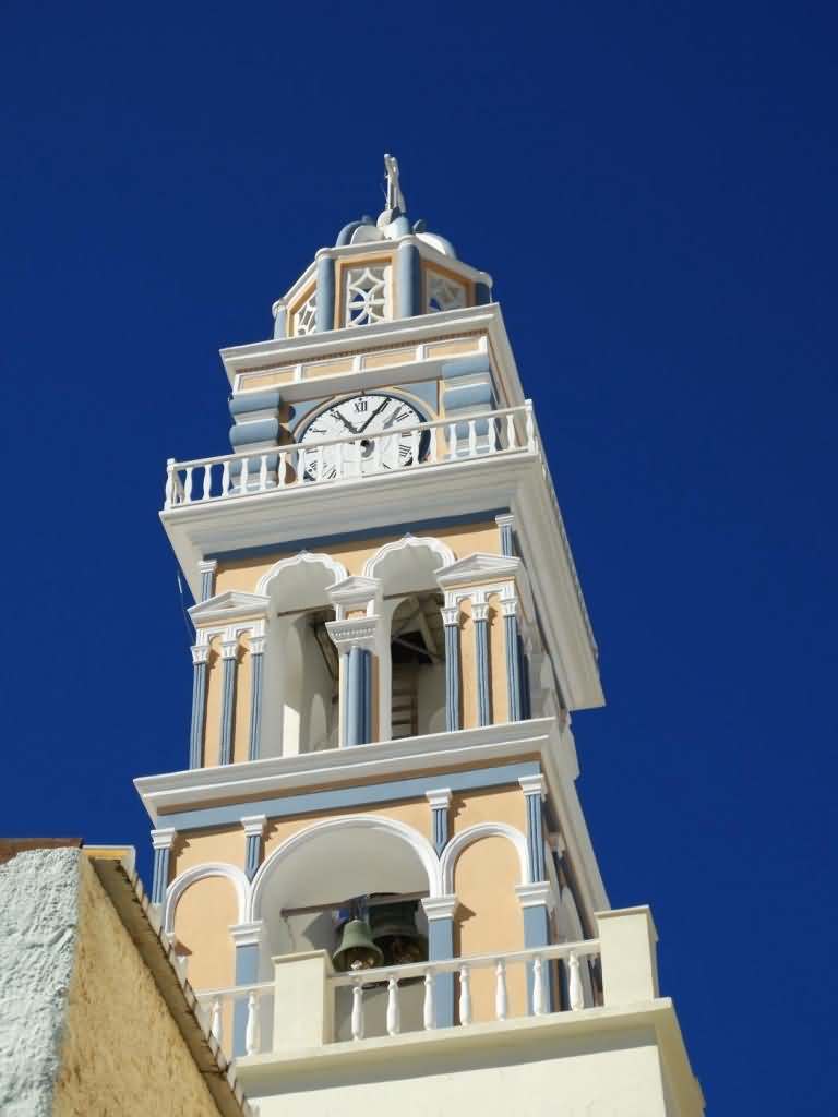 Clock Tower Of Blue Dome Church In Santorini