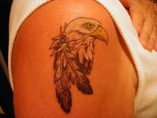 Cool Eagle Head With Feathers Tattoo on Siderib