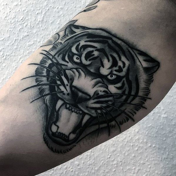 Cool Roaring Animated Tiger Head Tattoo On Inner Bicep
