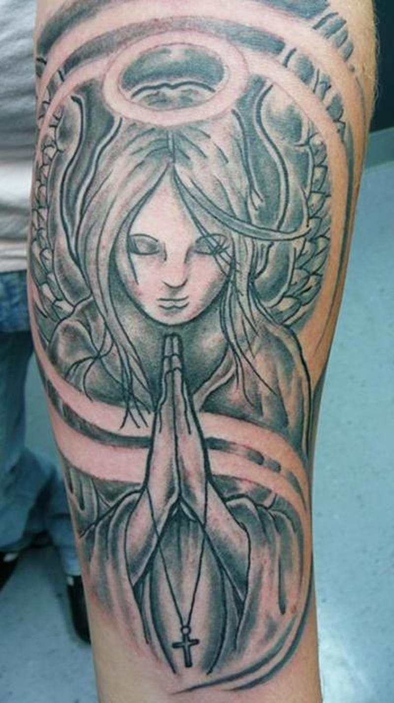 Fantastic Praying Angel With Halo Tattoo On Arm