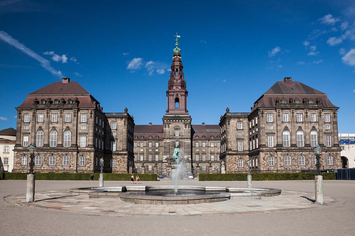 Fountain And Statue In Front Of The Christiansborg Palace