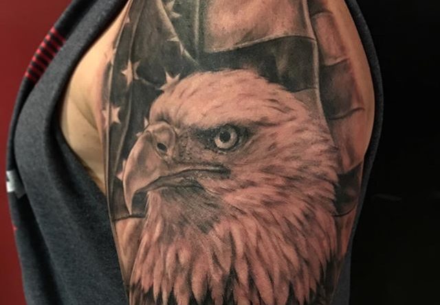 Grey Ink Dark American Flag With Bald Eagle Tattoo On Half Sleeve
