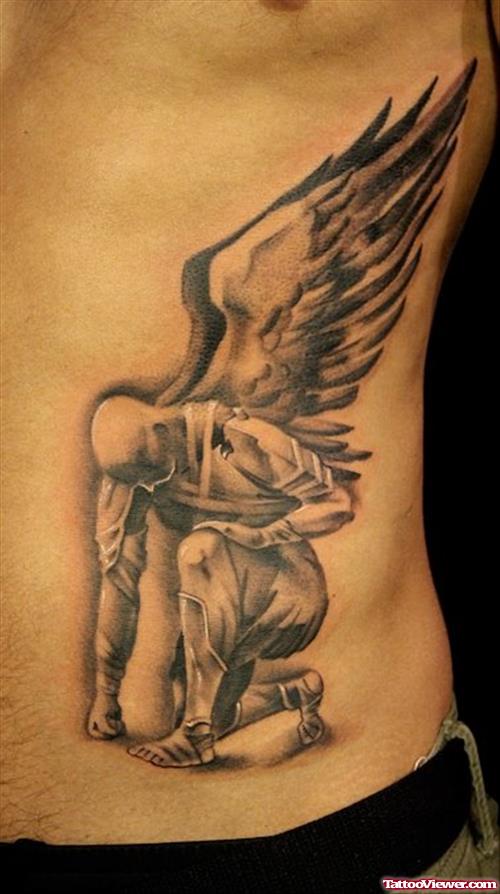 Grey Ink Fallen Angel Tattoo On Man SideRib