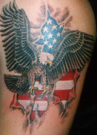 Grey Ink Flying Eagle With Ripped Skin American Flag Tattoo On Sleeve