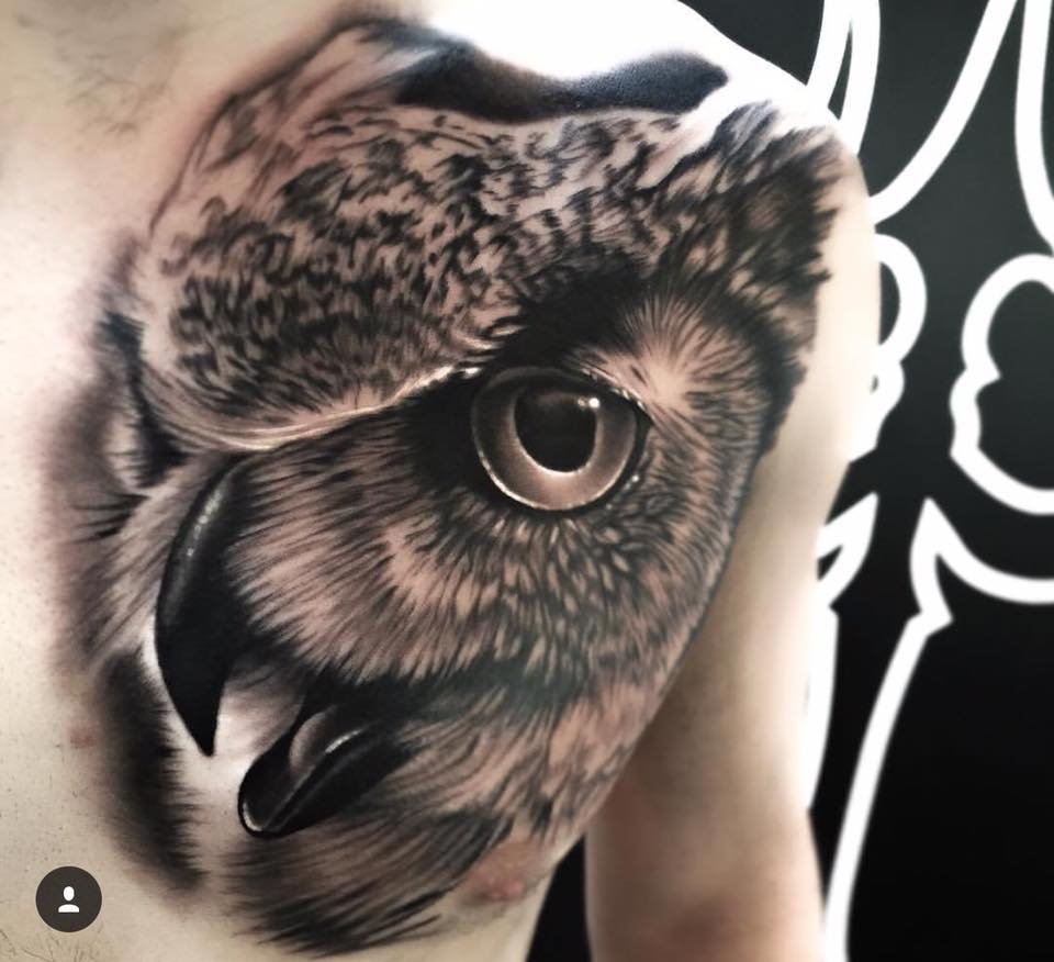 Grey Ink Realistic Eagle Eye Tattoo On Chest