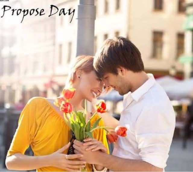 Happy Propose Day romantic couple with flowers picture