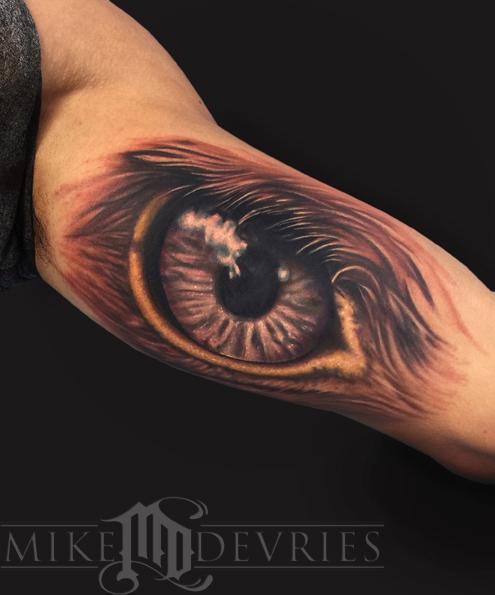 Incredible Eagle Eye Tattoo Design On Bicep By Mike DeVries