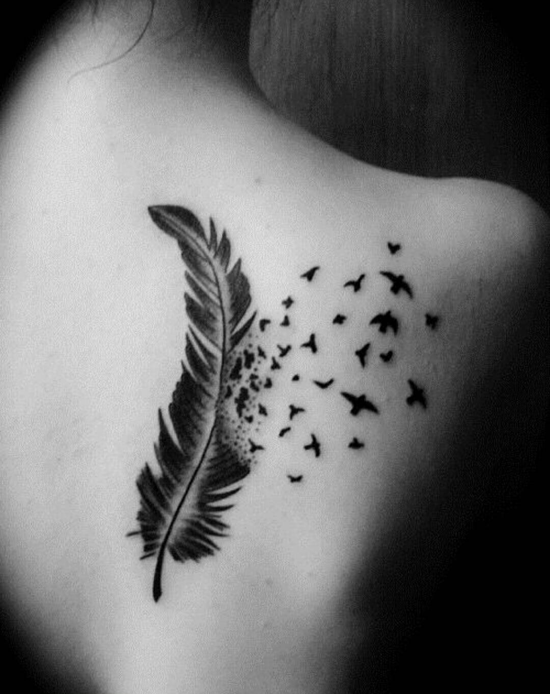 Incredible Tattoo Of Eagles Coming Out Of Eagle Feather On Girl Back