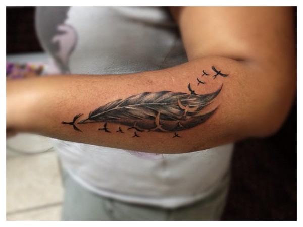 Marvelous Grey Ink Small Eagles With Large Eagle Feather Tattoo On Forearm