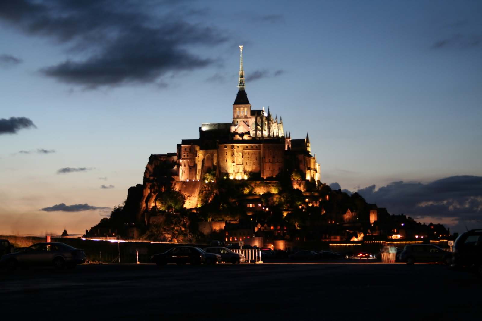 Mont Saint-Michel with lights at dusk