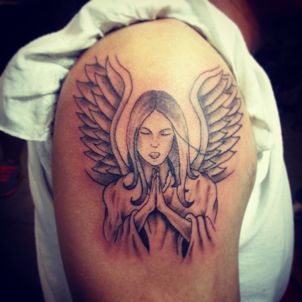 Nice Grey Ink Praying Angel Tattoo On Shoulder