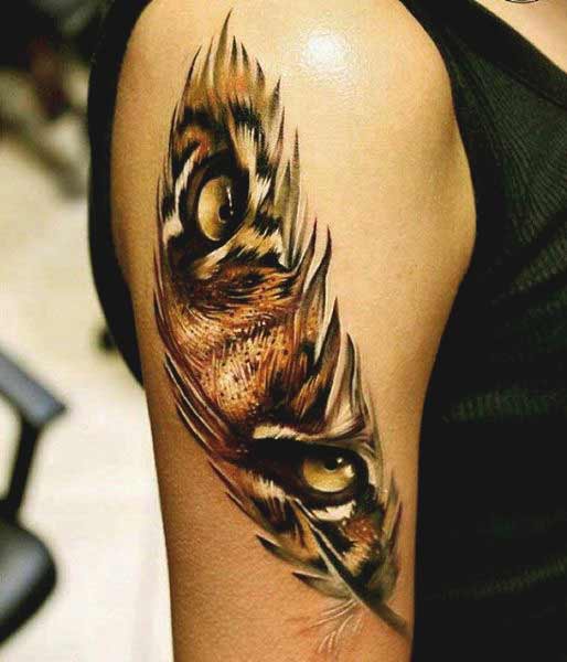 Realistic Tiger Eyes In Feather Tattoo On Half Sleeve