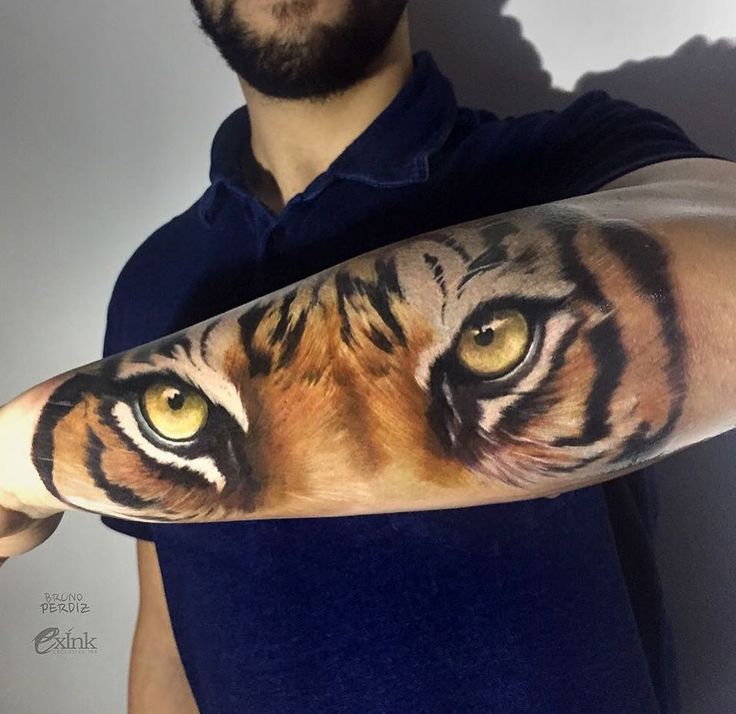 Realistic Tiger Eyes Tattoo On Forearm By Bruno Perdiz