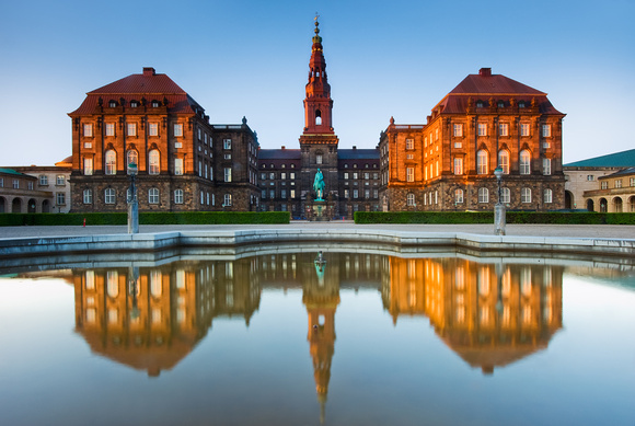 Reflection Of Christiansborg Palace At Dusk
