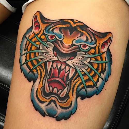 Roaring Cartoon Tiger Head Tattoo Done by Samuele Briganti