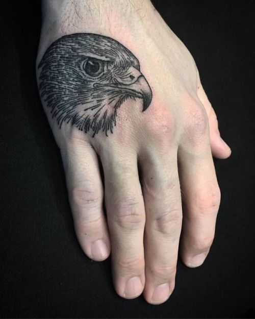 Small Black Ink Eagle Head Tattoo On Hand