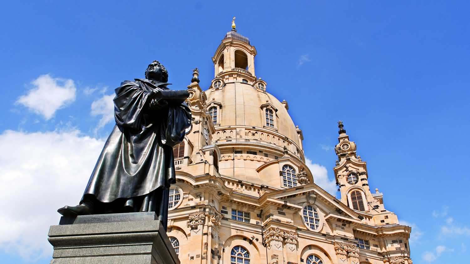 Statue of martin luther and Dresden Frauenkirche church