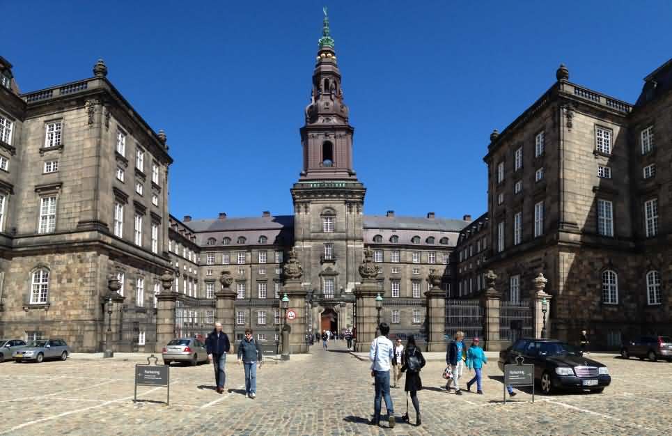 Tourists In Front Of The Christiansborg Palace