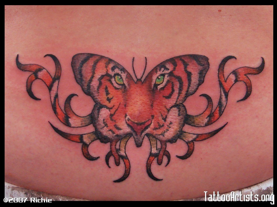 Tribal Style Colored Tiger Butterfly Tattoo On Lower Back For Girls