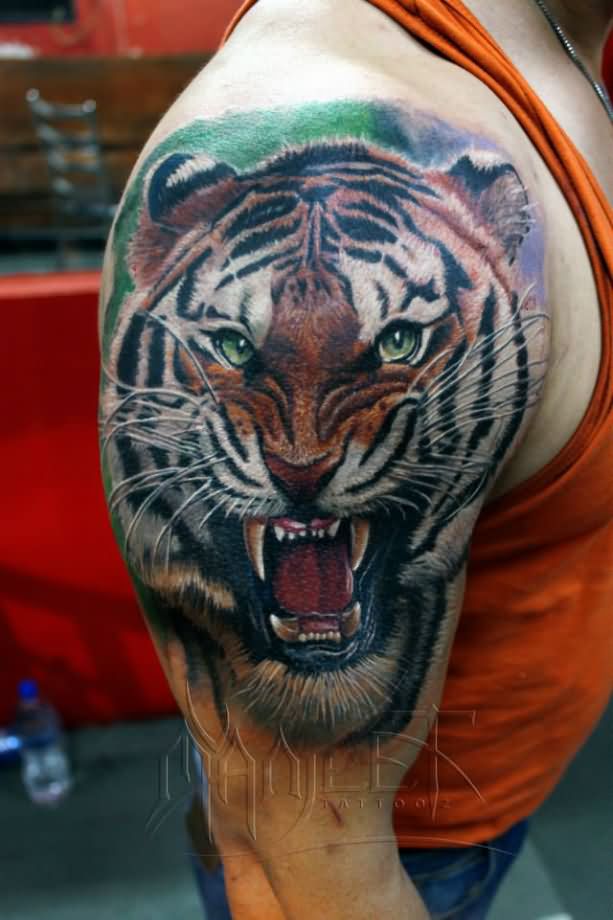 Wonderful Realistic Roaring Tiger Tattoo On Shoulder