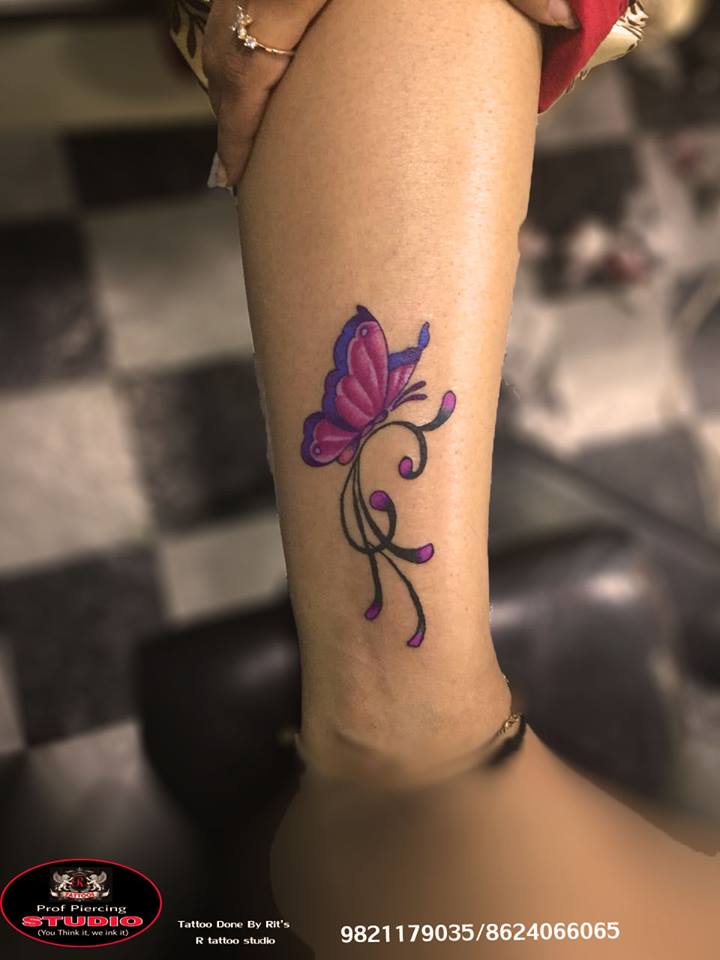 Colorful Butterfly Tattoo On Leg By R tattoo studio