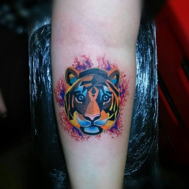 Amazing Colorful Geometrical Designed Tiger Face Tattoo On Forearm