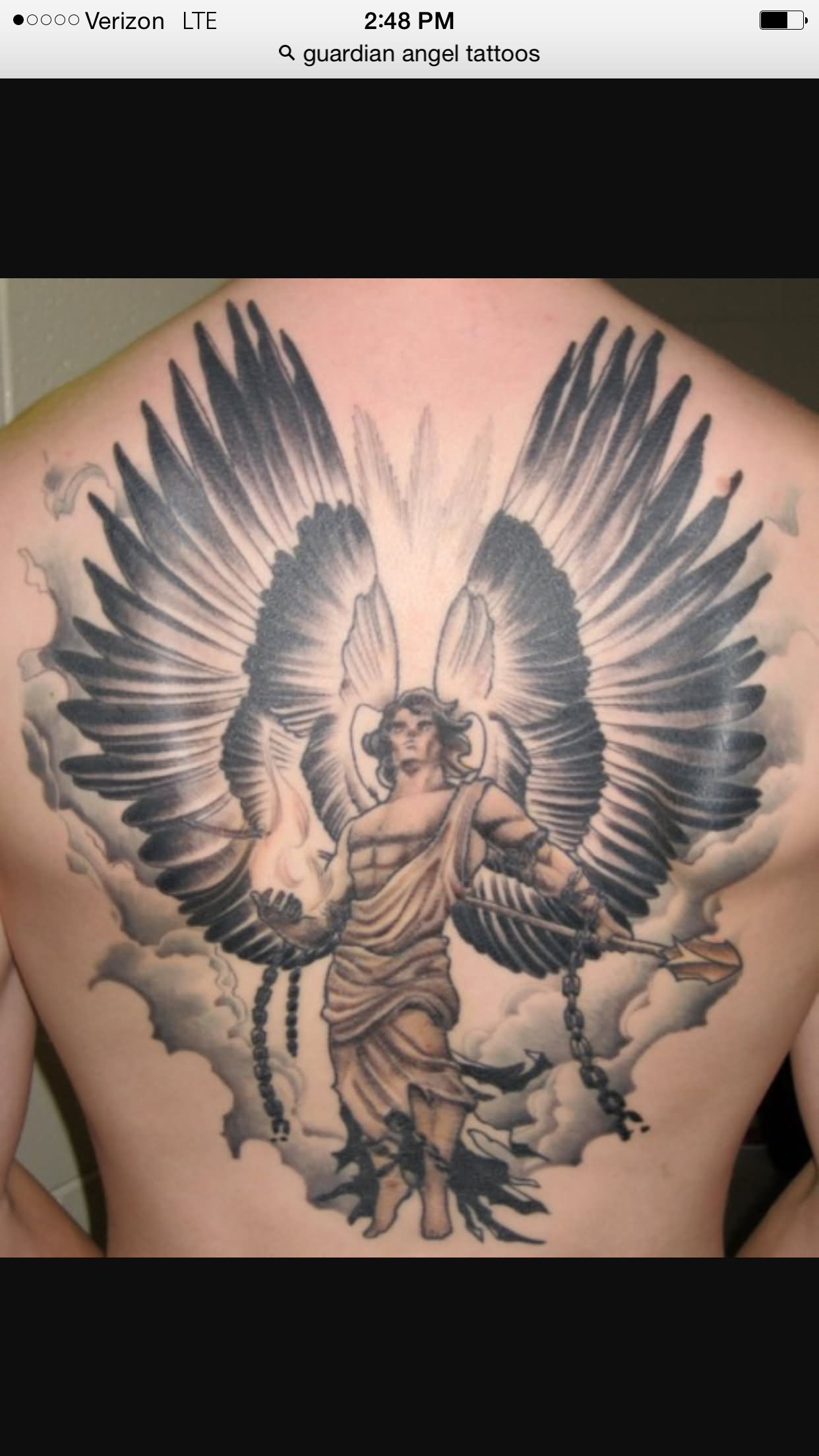 Amazing Grey Ink Warrior Guardian Angel Tattoo On Back