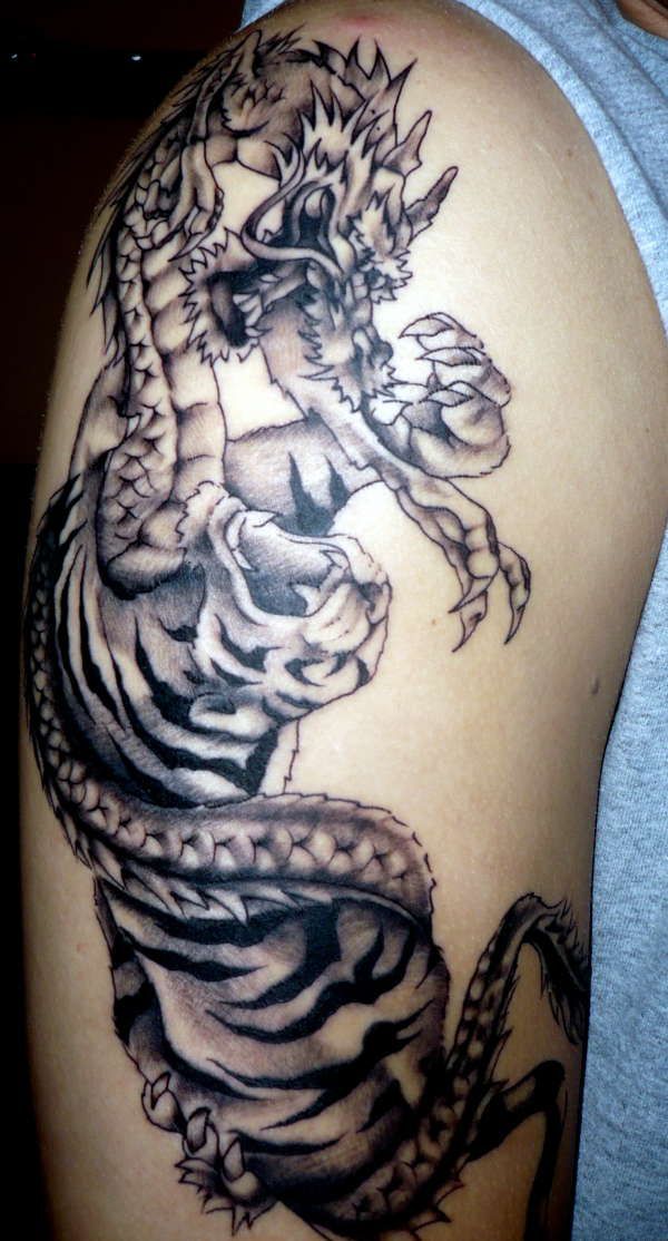 Amazing Tiger & Dragon Tattoo On Half Sleeve