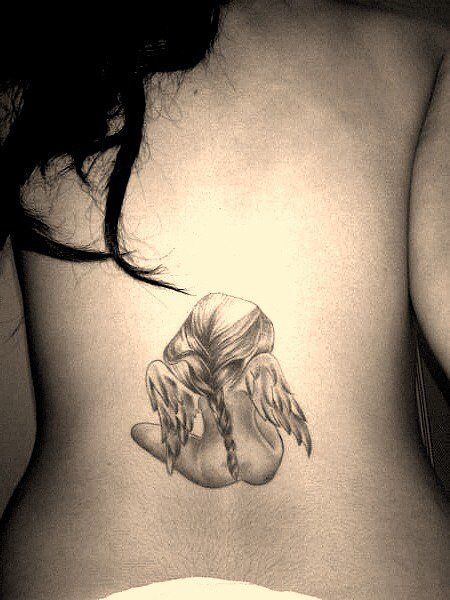 Beautiful Grey Ink Small Baby Girl Angel Tattoo On Lower Back