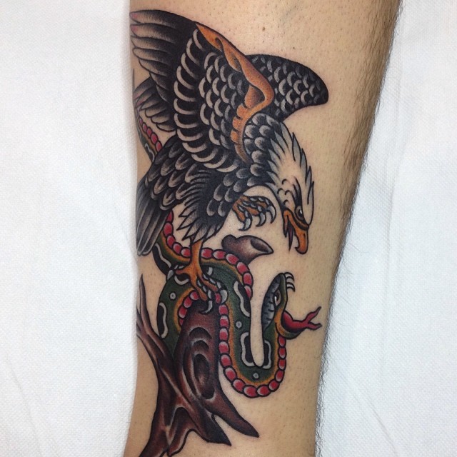 Beautiful Traditional Eagle And Snake Tattoo Design