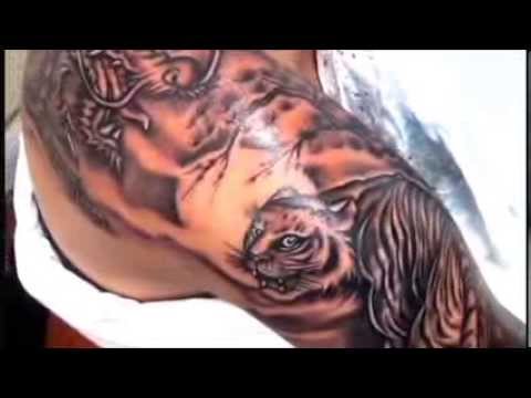 Black & Grey Ink Tiger & Dragon Tattoo On Shoulder