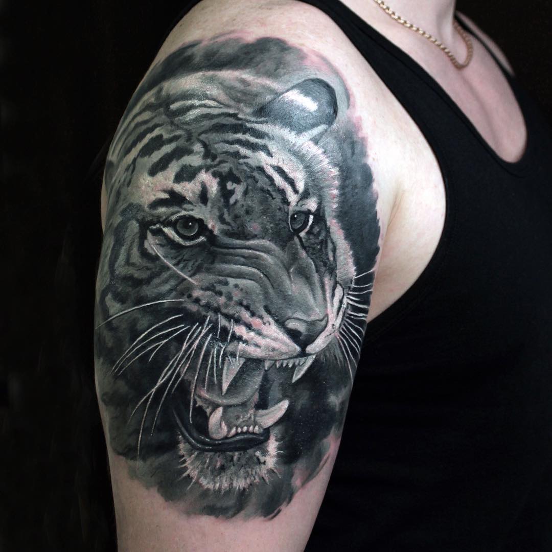 Black Ink Dark Tiger Tattoo On Shoulder