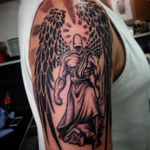Black Ink Muscular Faceless Guardian Angel Tattoo On Half Sleeve