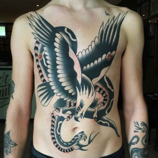 Black Ink Traditional Eagle & Snake Fight Tattoo On Full Body