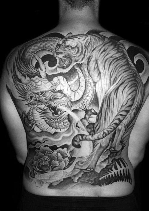 Black & White Dragon Vs. Tiger Tattoo On Full Back For Men
