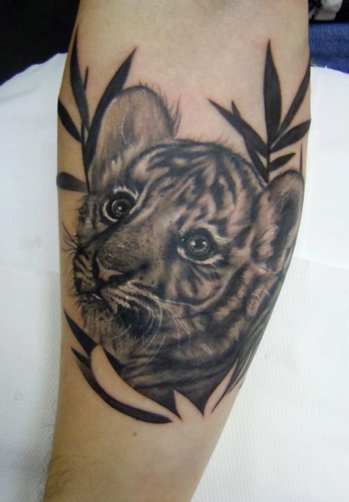 Black & White Realistic Tiger Cub Head Tattoo On Forearm