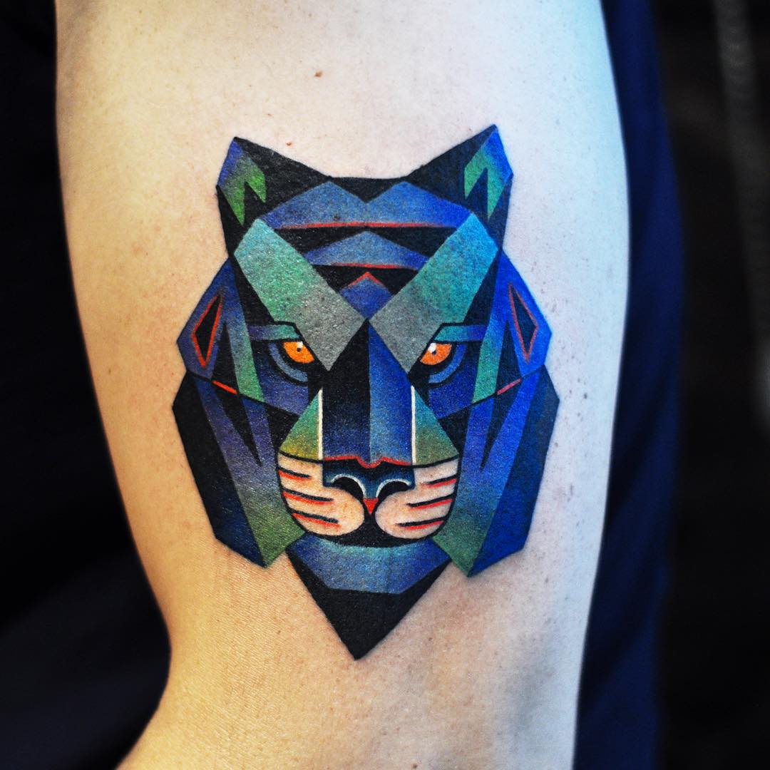 Blue Colored Geometrical Designed Tiger Head Tattoo On Half Sleeve
