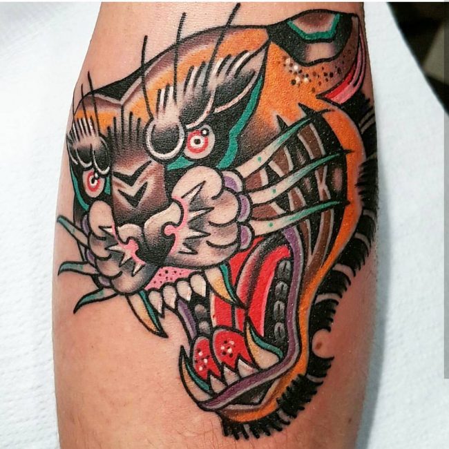 Colored Traditional Tiger Tattoo On Arm