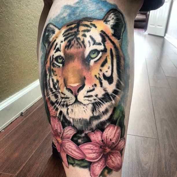 Colorful Realistic Tiger Head With Flowers Tattoo On Calf (Leg)