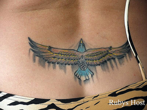 Colorful Soaring Eagle Tattoo On Lower Back