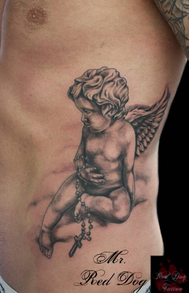 Cute Cherub With Rosary Tattoo On Siderib