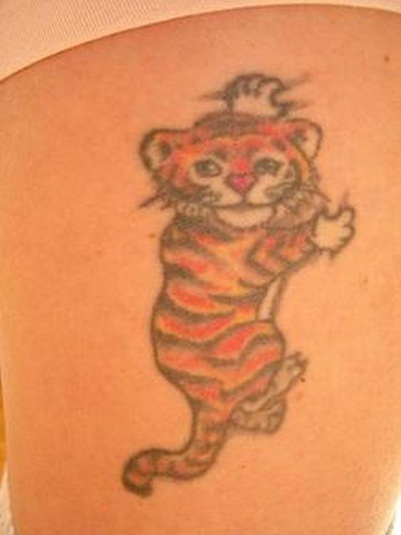 Cute Climbing Tiger Cub Tattoo Design