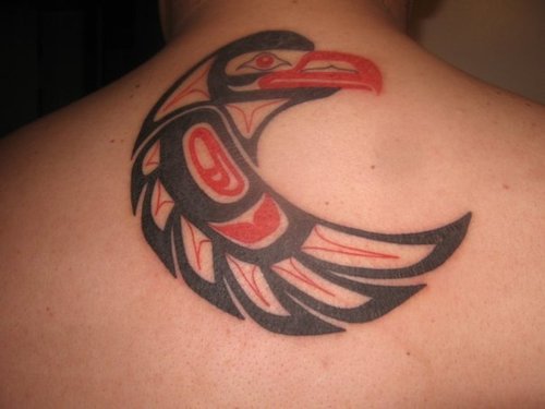 Cute Haida Eagle Head Tattoo Design On Upper Back