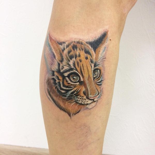 Cute Small Baby Tiger Face Tattoo On Forearm